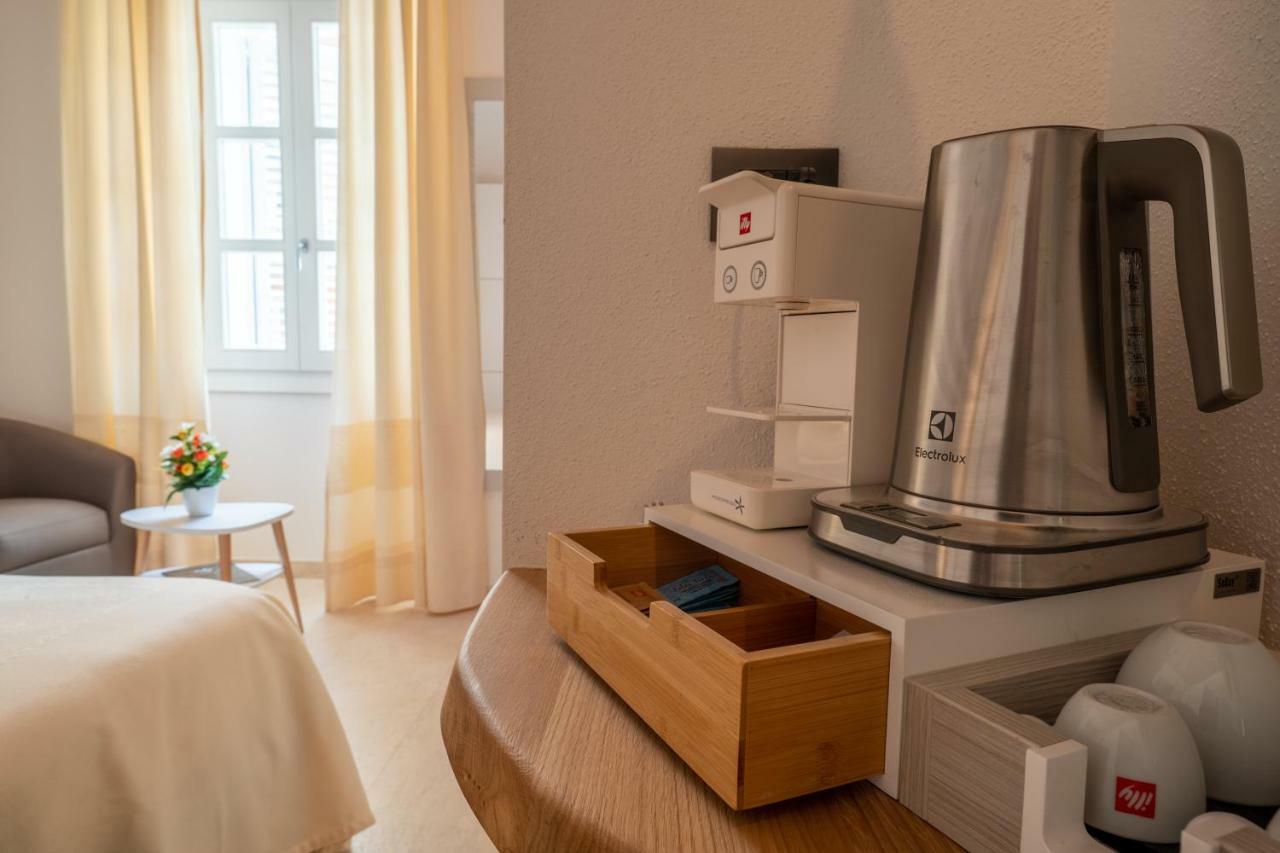 Corso Umberto Rooms Ольбия Экстерьер фото